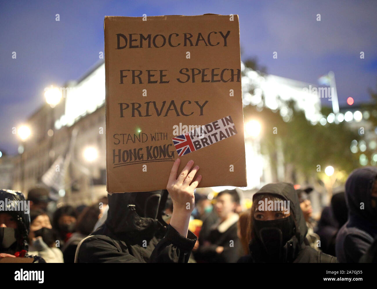 Hong Kong pro-democracy protesters taking part in a Hong Kong solidarity rally in Trafalgar Square, London. Stock Photo
