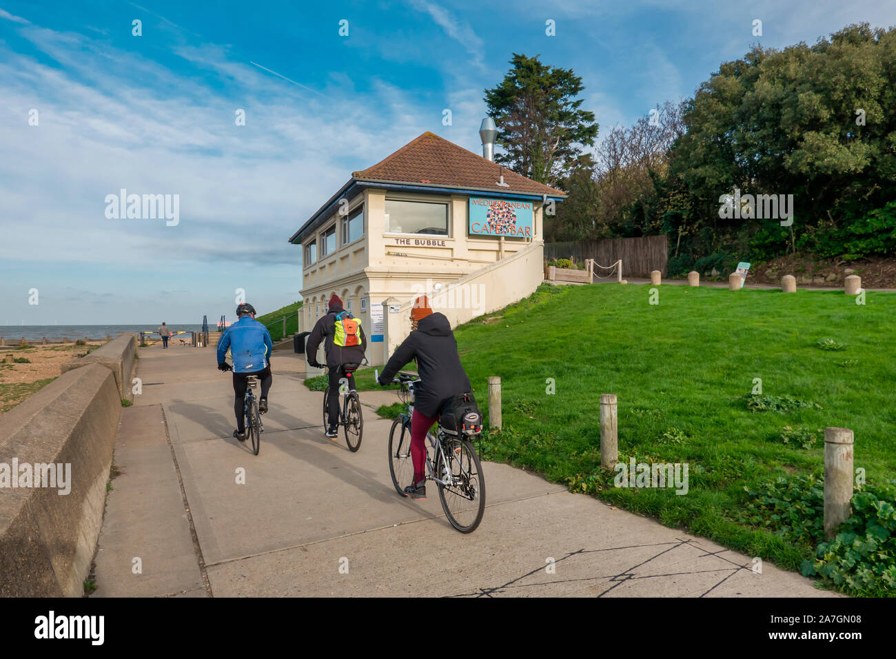 Cycling,Promenade,Sea Wall,Whitstable,Kent,England Part of the Saxon Shore Way Stock Photo