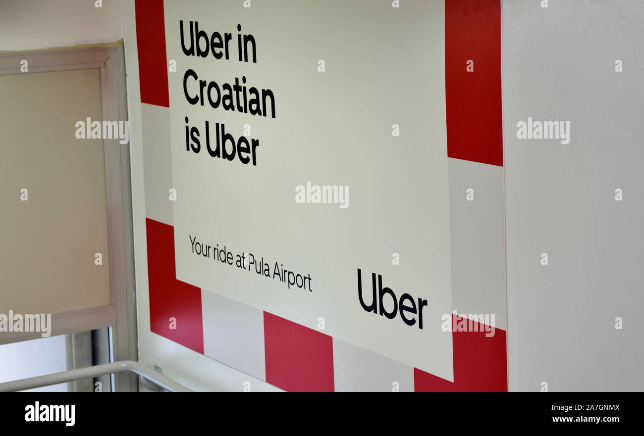 Uber in Croatian is Uber sign at Pula Airport, Croatia Stock Photo 
