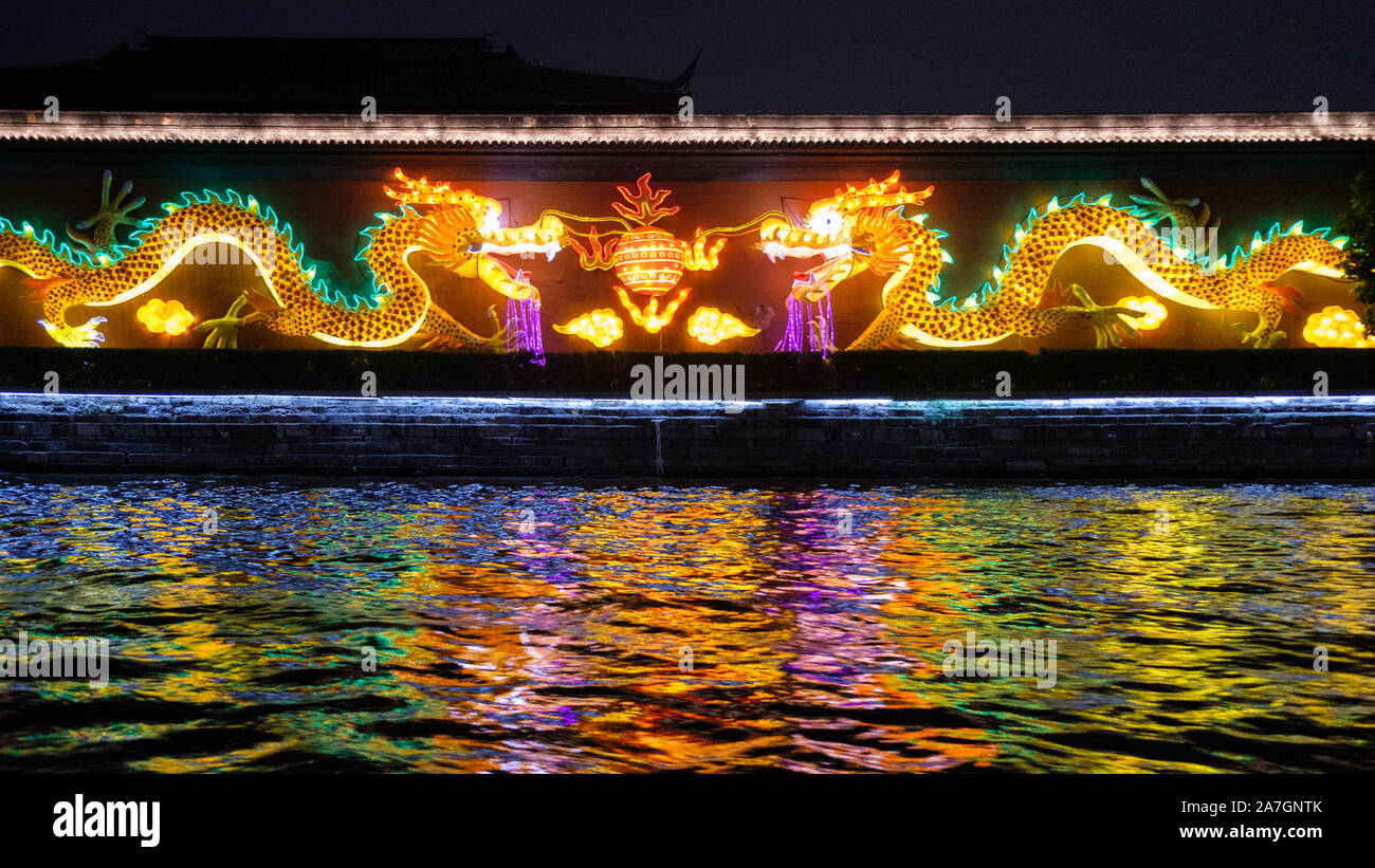 Illuminations at night seen from boat on the Qinhuai river in Nanjing, Jiangsu Province, China Stock Photo