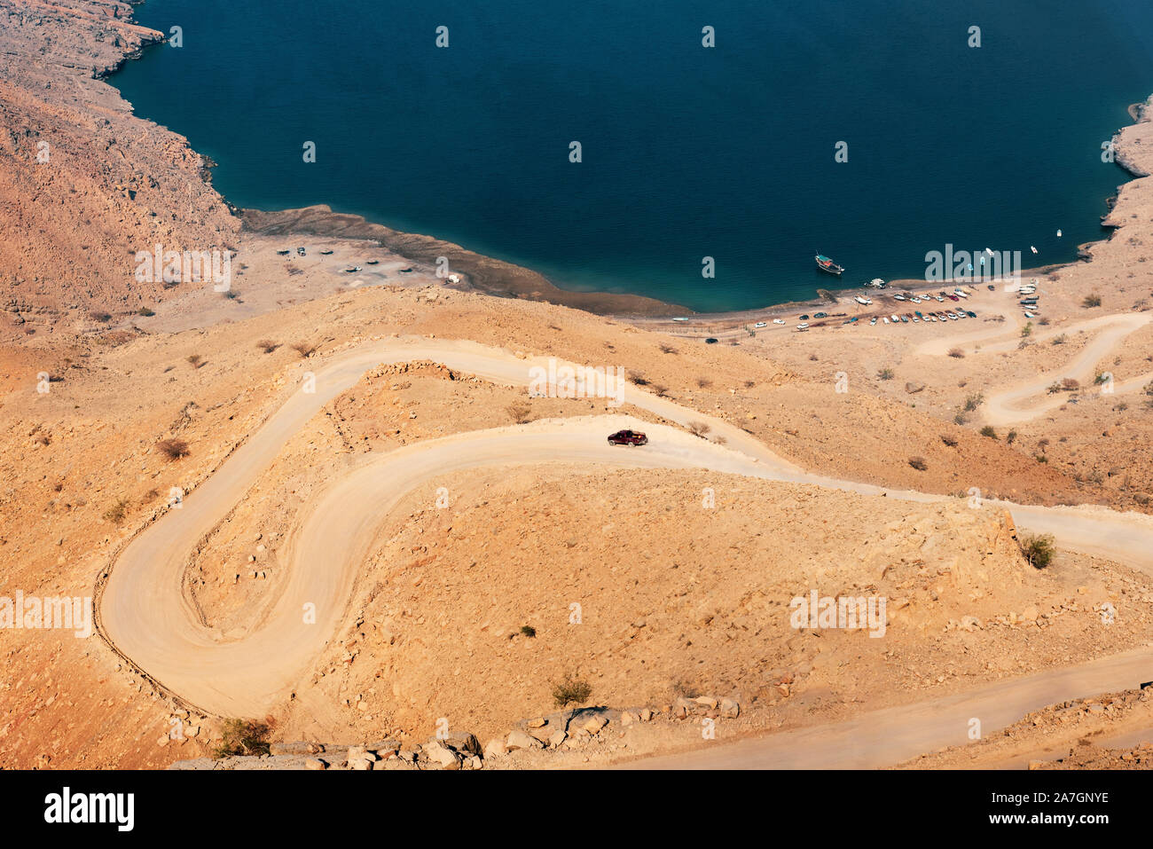 Car on the sand road at Fjord Khor Najd in Musandam Oman Stock Photo