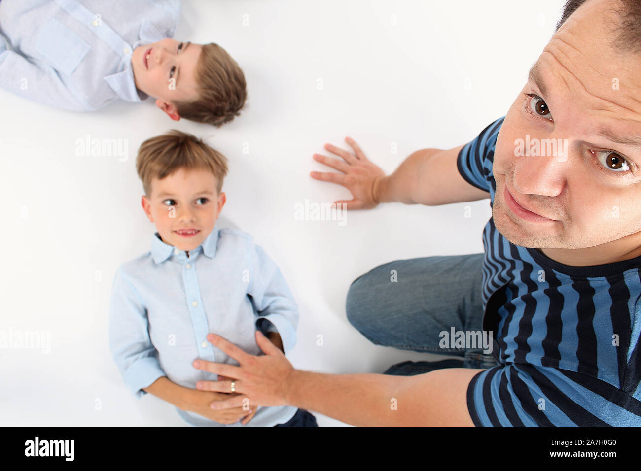 Good father nurturing his children Stock Photo