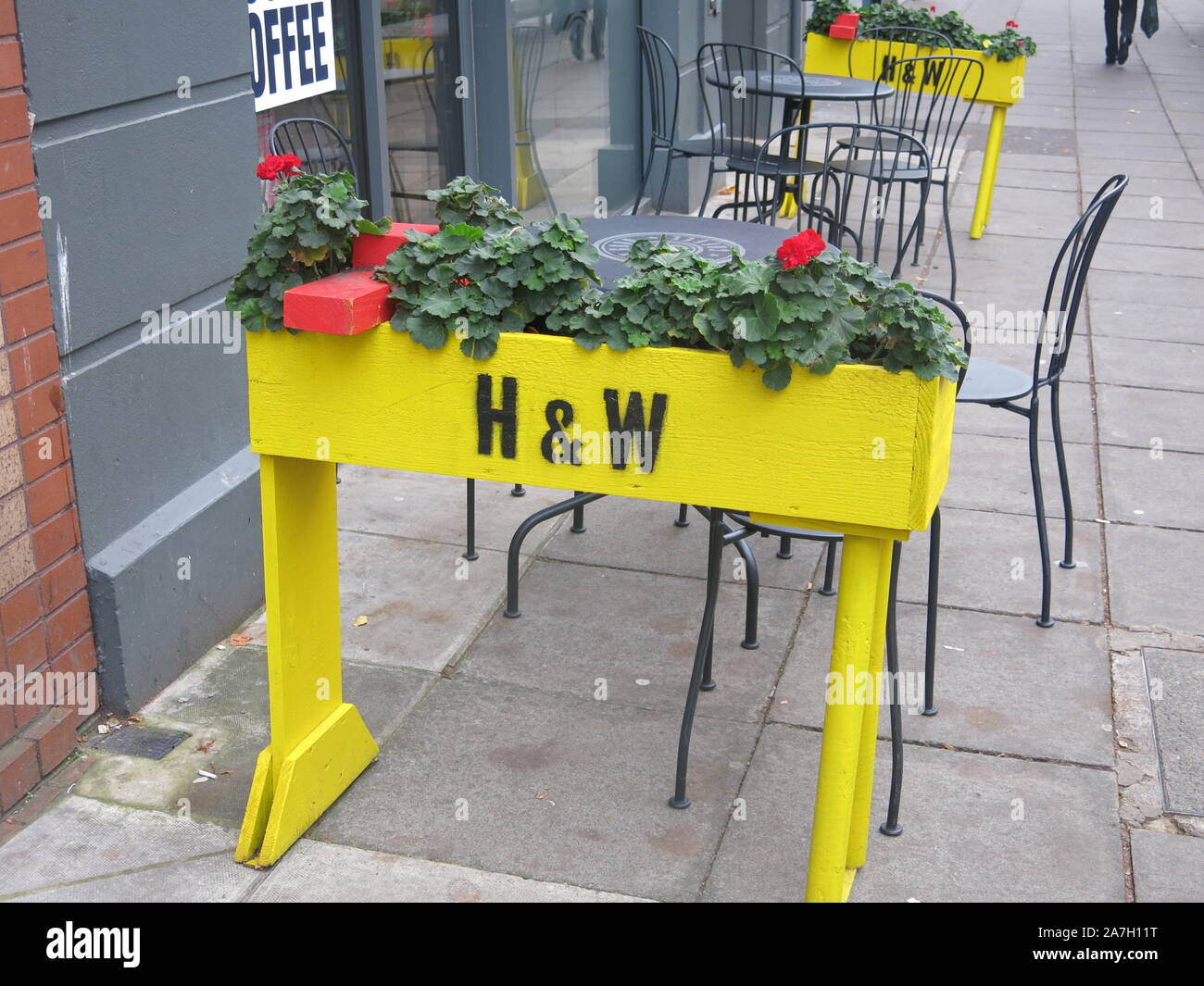 The iconic yellow cranes of Harland & Wolff that dominate the Belfast  skyline are used as the inspiration for these flower planters in the city  centre Stock Photo - Alamy