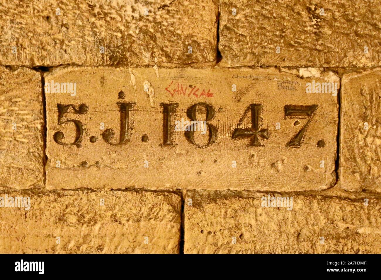 Quarry inspector inscription on bricks inside the Paris Stock