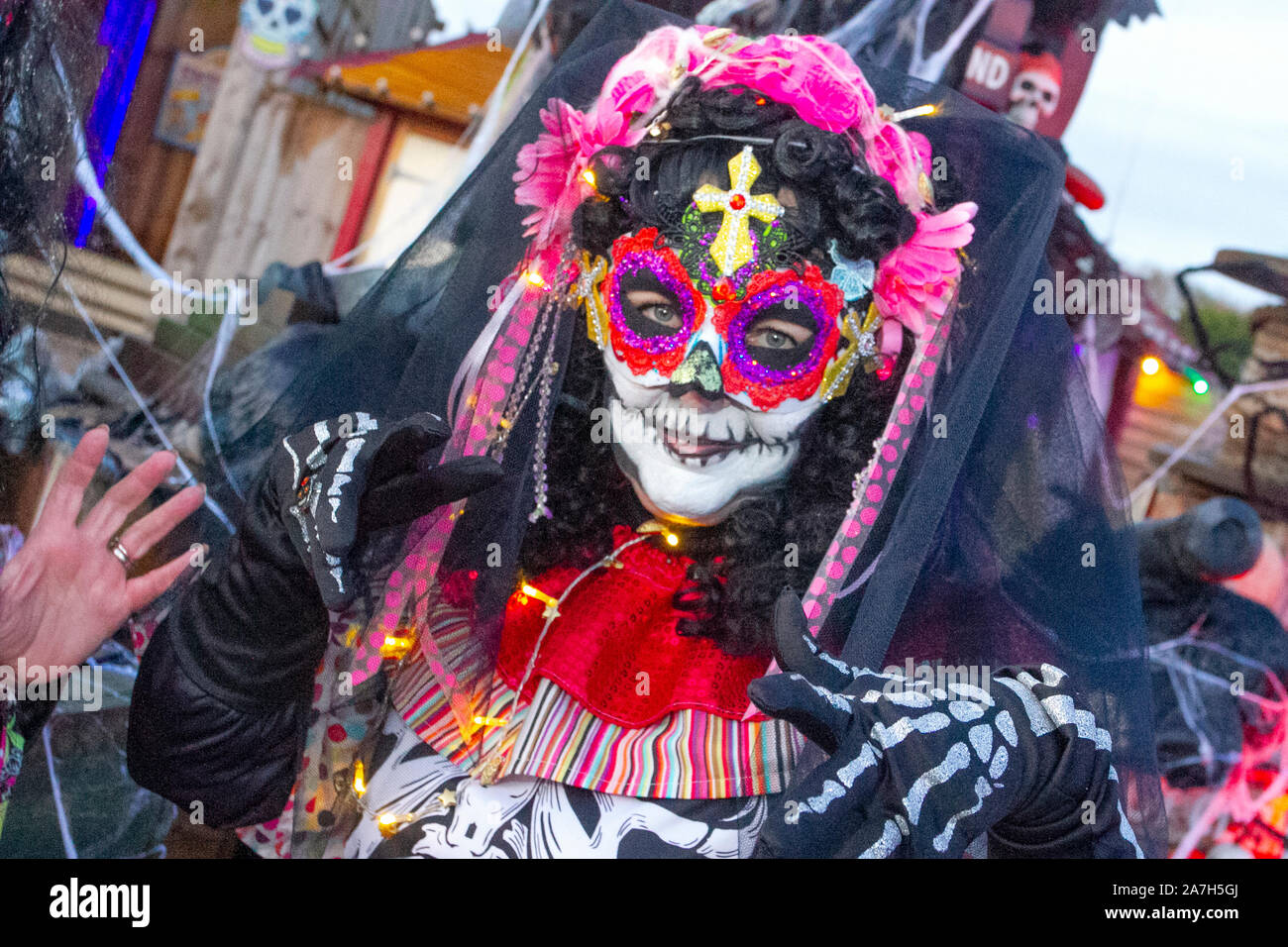 Southport, Merseyside. UK Weather. 2nd Nov, 2019. Day Of The Dead' Festival – November is the host month to Mexico's Day of the Dead – and Southport Pleasureland staged its own twist on the Mexican celebration with explosive colour and vibrant revelry in a feast for the senses.  A host of fantastic entertainment including stilt walkers, flame eaters, music, dancers.  Credit; MediaWorldImages/AlamyLiveNews Stock Photo