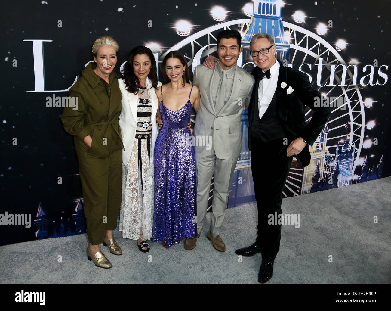 (L-R) Emma Thompson, Michelle Yeoh, Emilia Clarke, Henry Golding & Paul Feig attend the 'Last Christmas' premiere on October 29, 2019 in New York City. Stock Photo