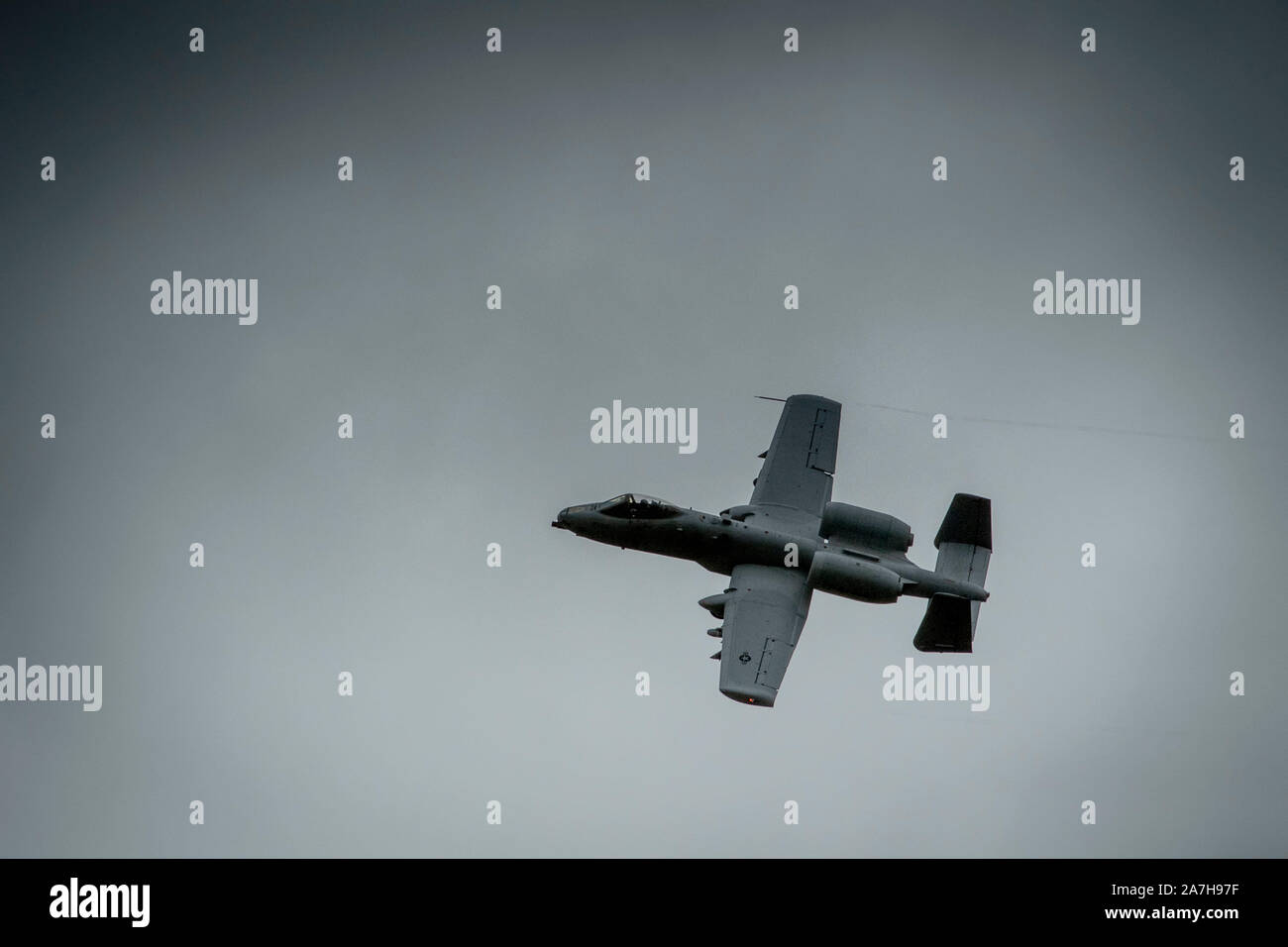 An A-10 Thunderbolt II aircraft assigned to the 107th Fighter Squadron, Selfridge ANG Base, Mich., supports Joint Terminal Attack Controllers from the Latvian National Armed Forces as they conduct close air support training at Grayling Aerial Gunnery Range in Waters, Mich., October 29, 2019.     Michigan and Latvia have been linked under the U.S. National Guard Bureau's State Partnership Program since 1993. The collaboration between JTACs in the Latvian National Armed Forces and the Michigan Air National Guard is one of the most productive examples of bilateral defense cooperation in the entir Stock Photo