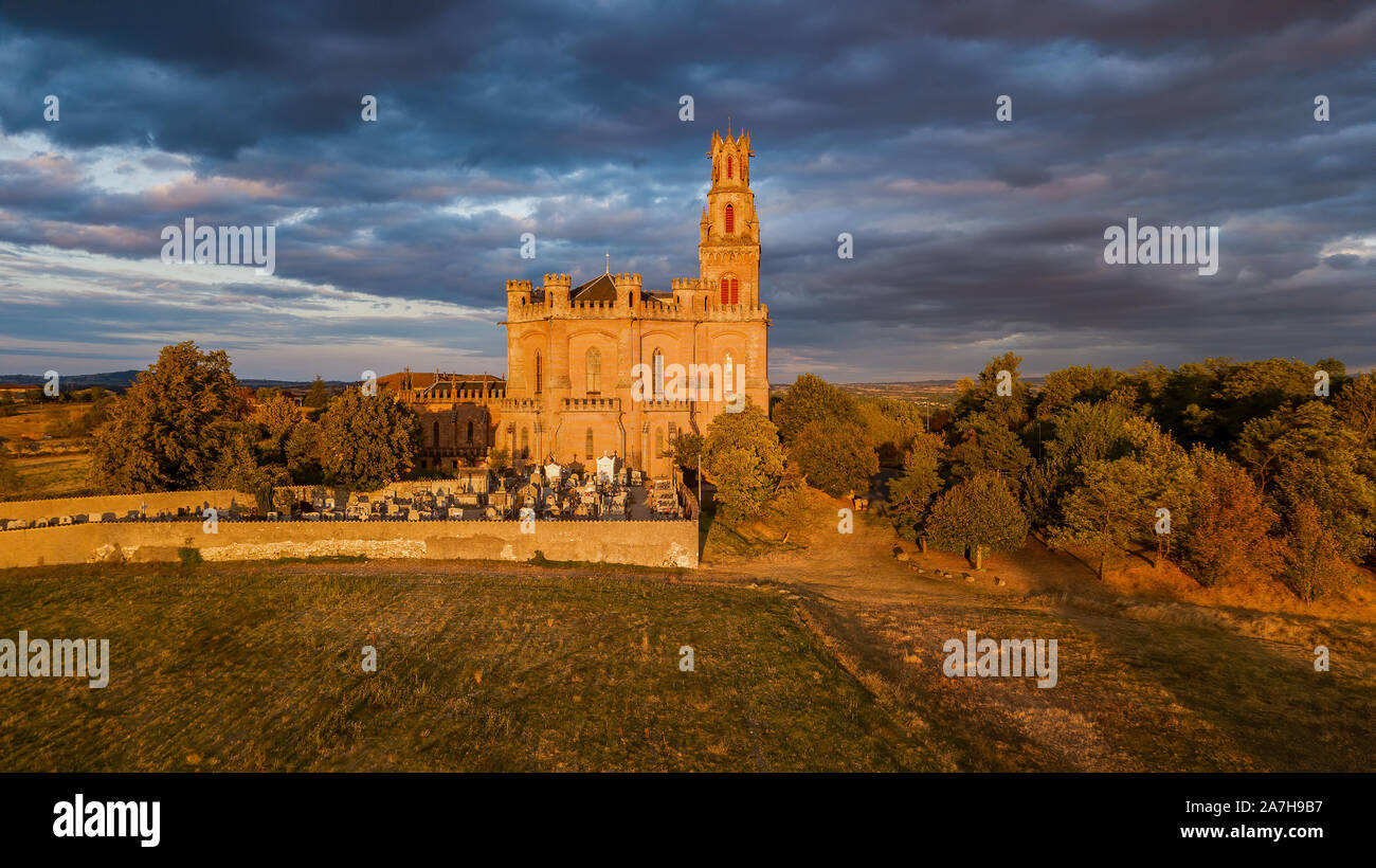Church Notre Dame de la Dreche outside Albi city with dramatic clouds and  sunset golden sunlight Stock Photo - Alamy