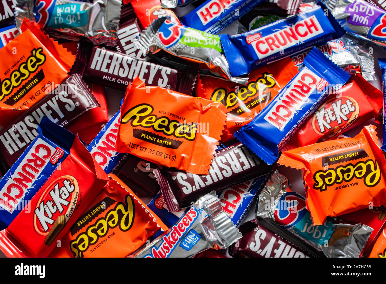 A large pile of snack size candy bars for a Halloween Trick or Treat party. Stock Photo