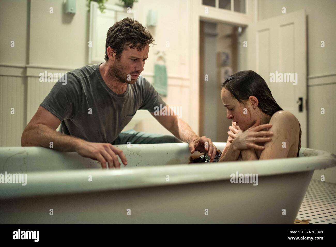 DAKOTA JOHNSON and ARMIE HAMMER in WOUNDS (2019), directed by BABAK