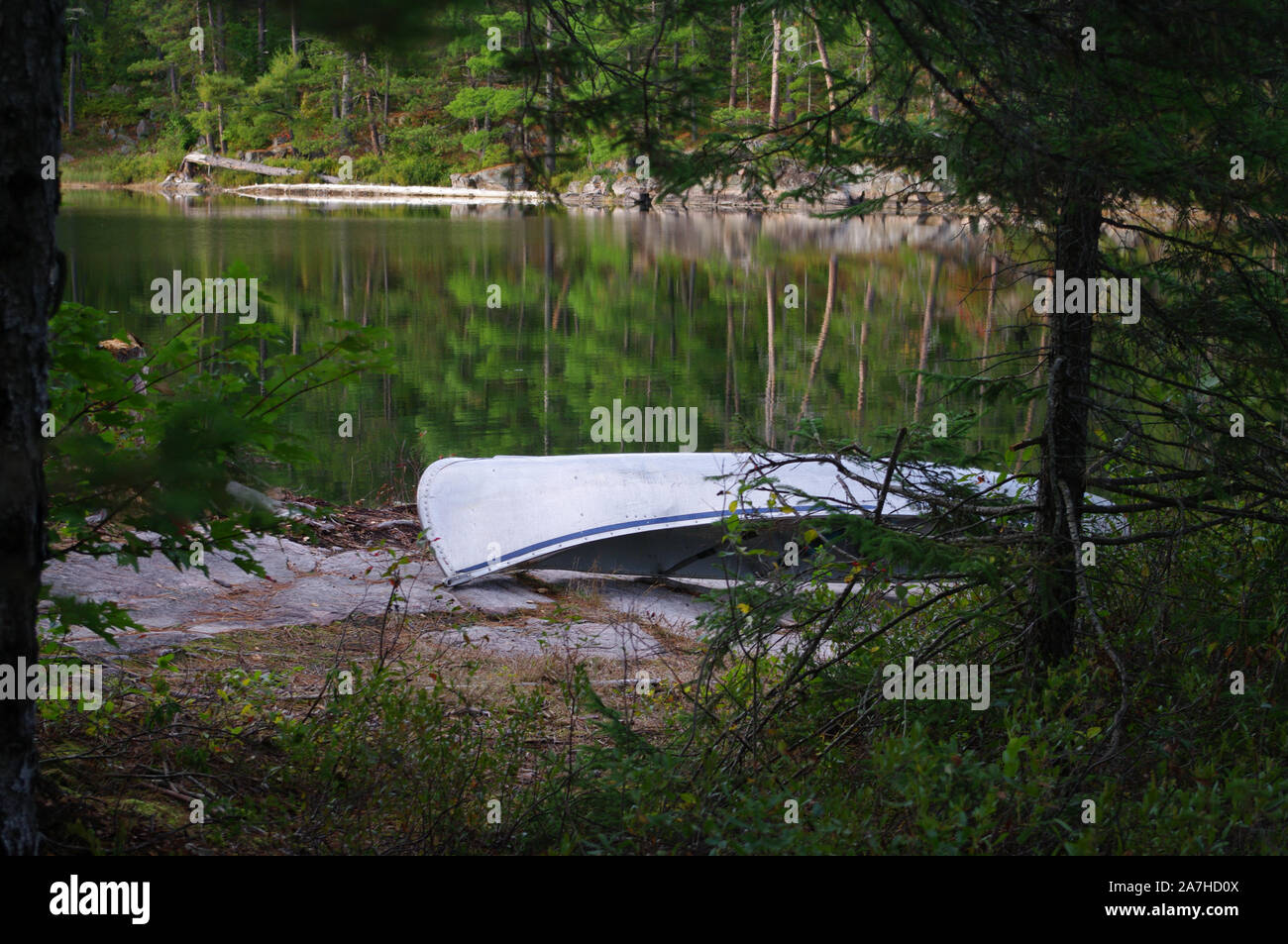 Canoe on the Lake Shore in Algonquin Park at Lake Opalescent Campsite