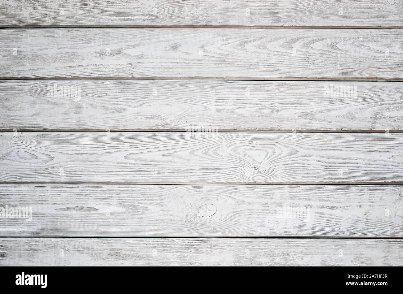 Wooden background texture. Creatively painted white and grey boards. Stock Photo