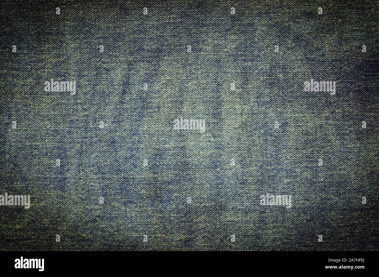 Dark fabric background. Dark blue jeans texture. Stock Photo