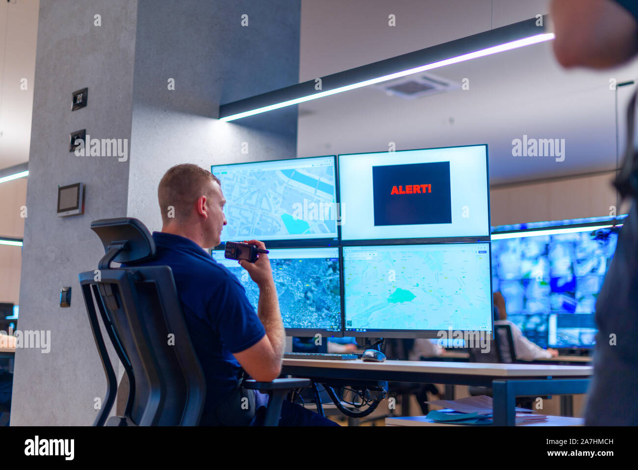 Female security operator monitoring hi-res stock photography and images ...