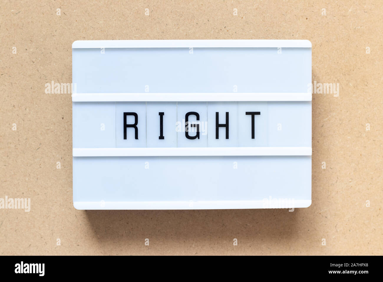 White lightbox with word right on wood background Stock Photo Alamy