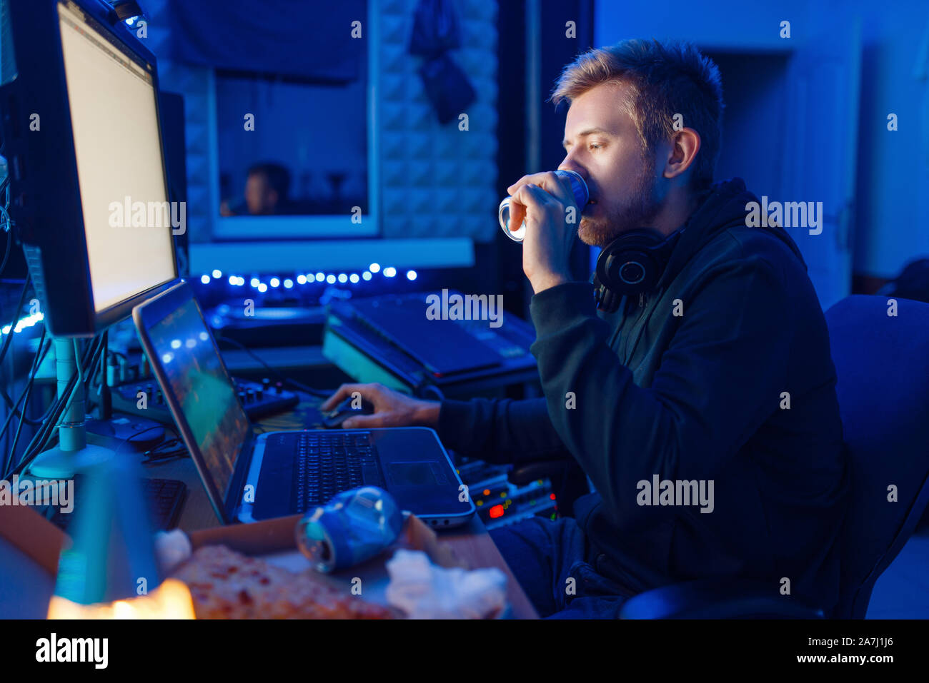 Gamer drinking an energy drink, gaming lifestyle Stock Photo Alamy