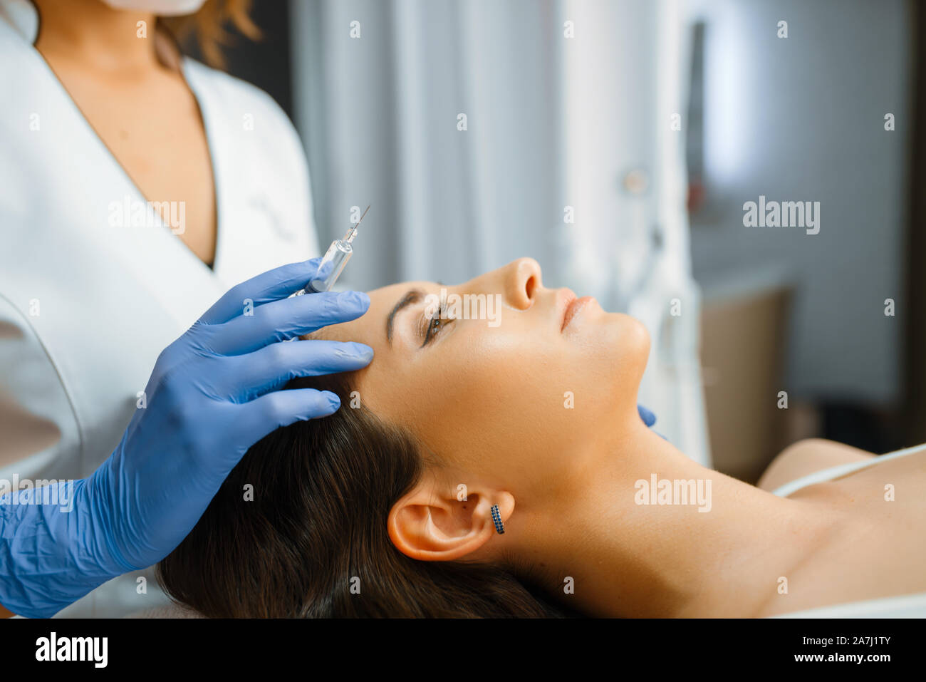 Cosmetician holds syringe with botox injection Stock Photo Alamy