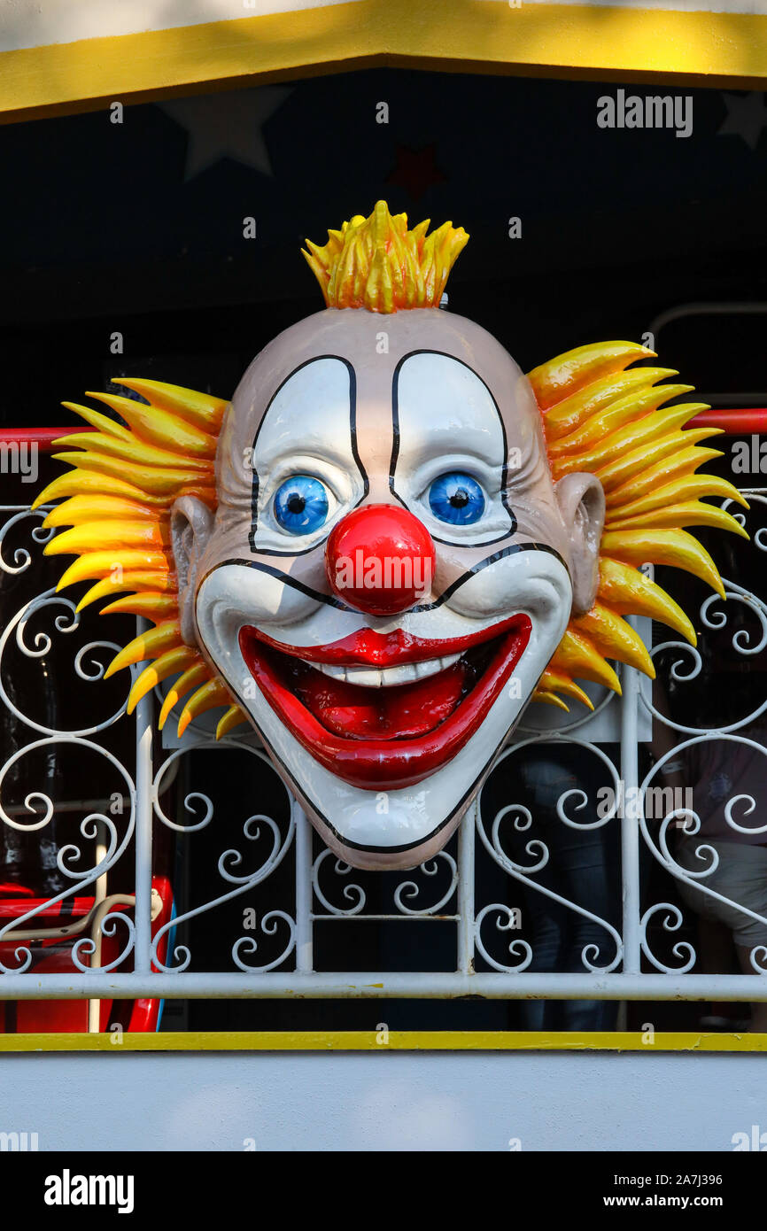 Clown face on fun house facade in Linnanmäki amusement park in Helsinki, Finland Stock Photo