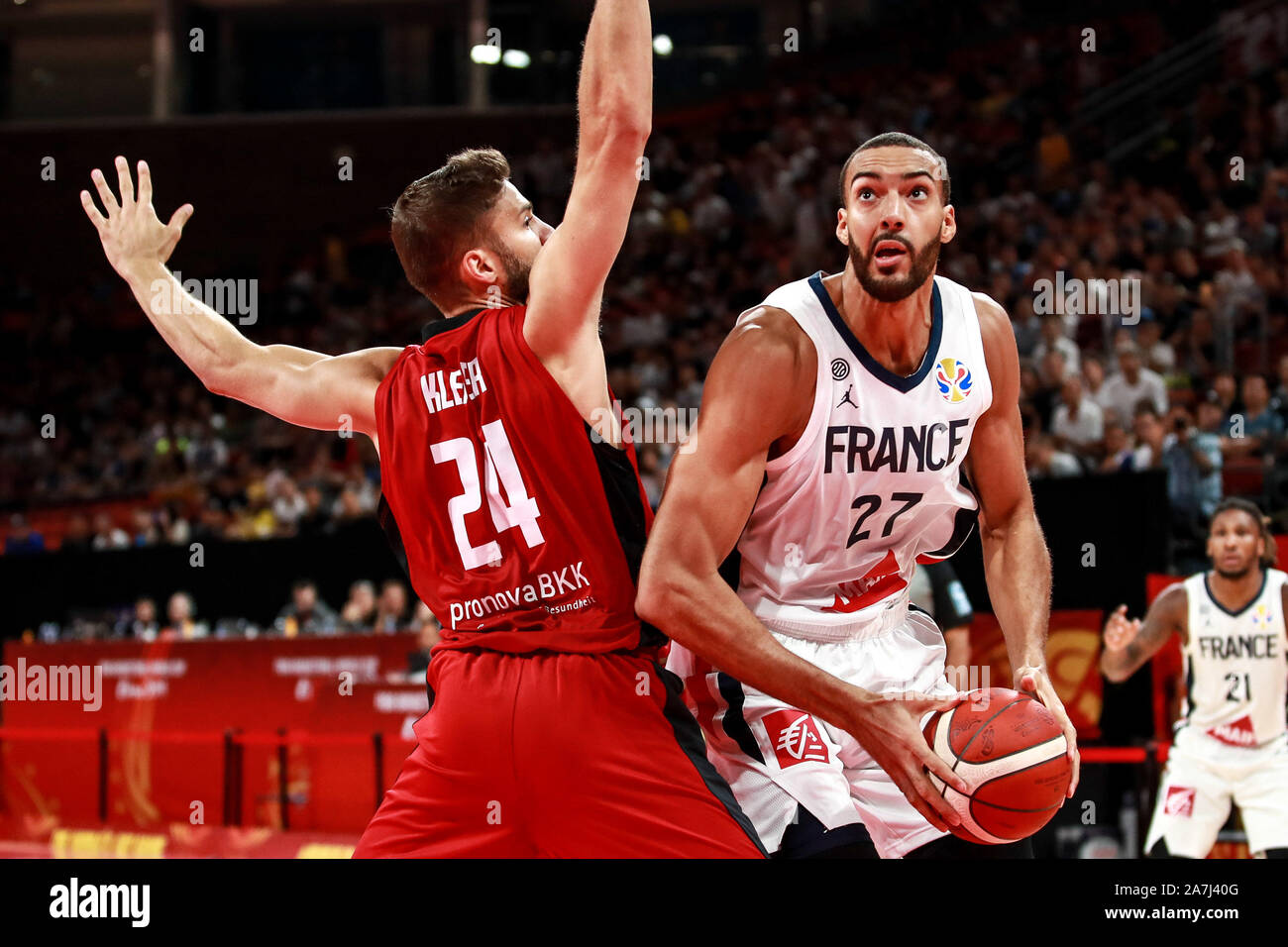 Rudy Gobert, right, of France national basketball team passes the ball  against Maximilian Kleber of Germany national basketball team in the first  foun Stock Photo - Alamy