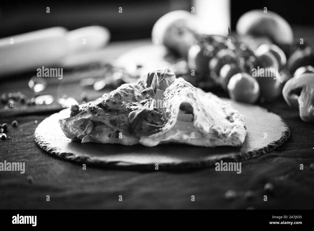 tasty italian calzone pizza dish with fresh ingredients Stock Photo