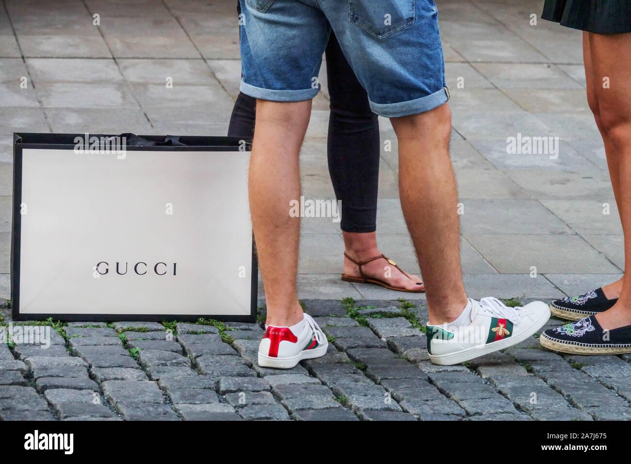 Gucci shoping bag and Gucci sneakers, Prague Czech Republic Stock Photo -  Alamy