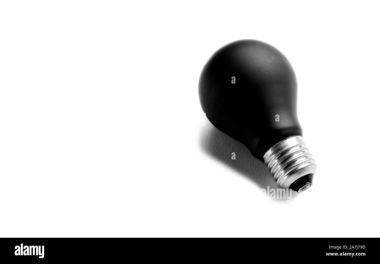 Black bulb isolated on white background. Concept of power outage or reactionary thought and ideas Stock Photo
