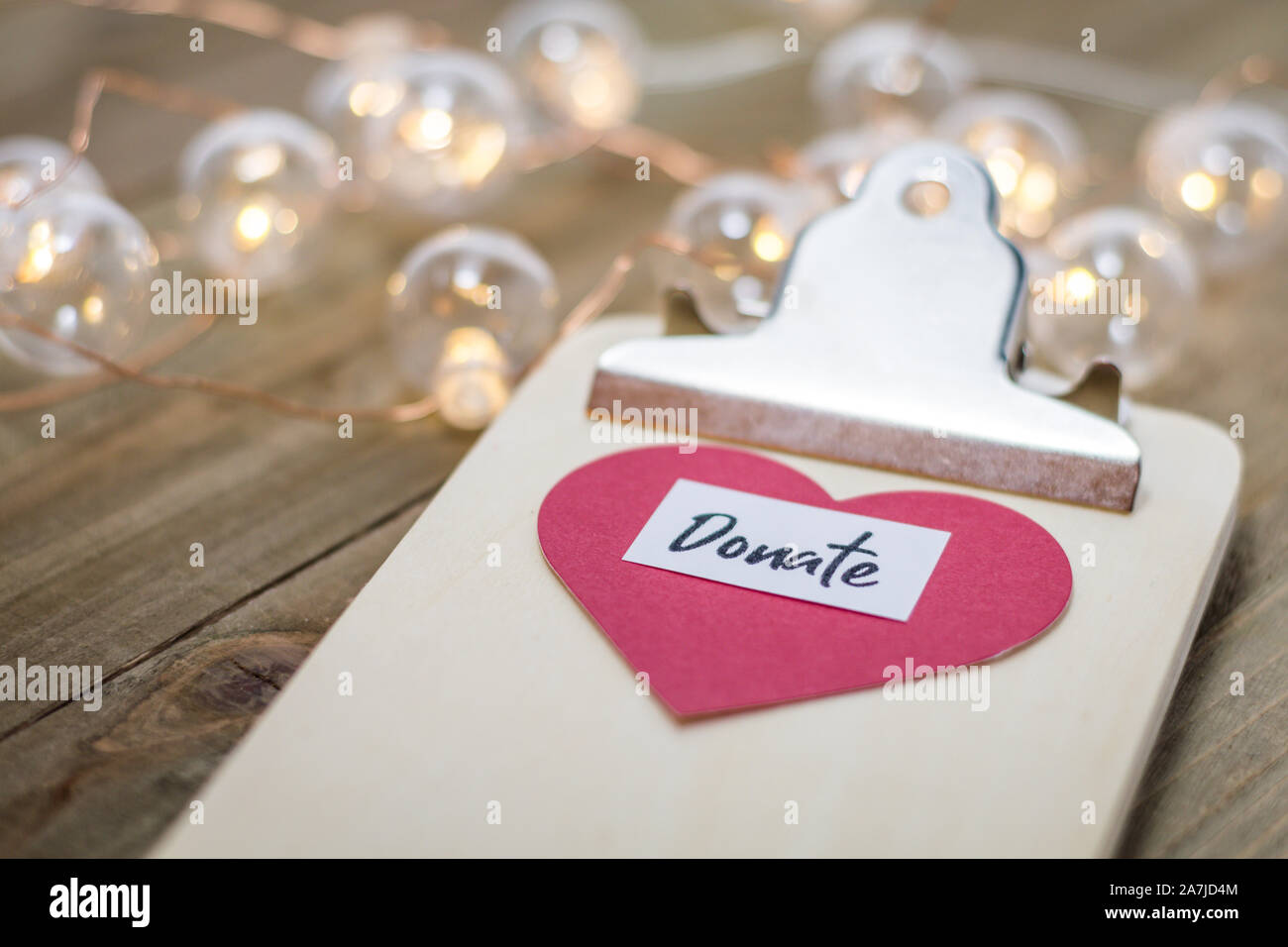 Giving Tuesday donate charity concept with text and cash credit cards