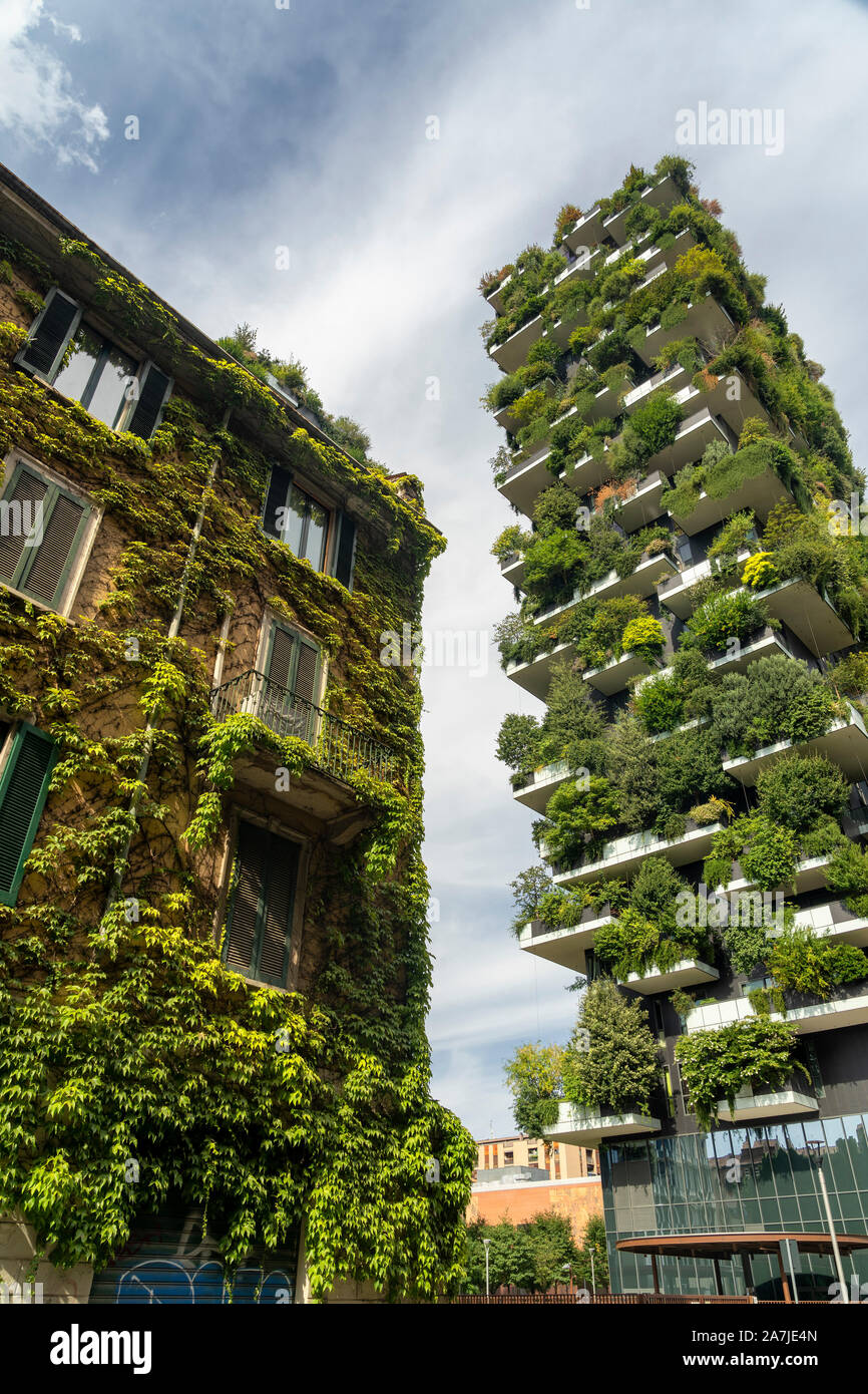 Bosco Verticale, modern towers with plants, and old typical house in Milan, Lombardy, Italy Stock Photo