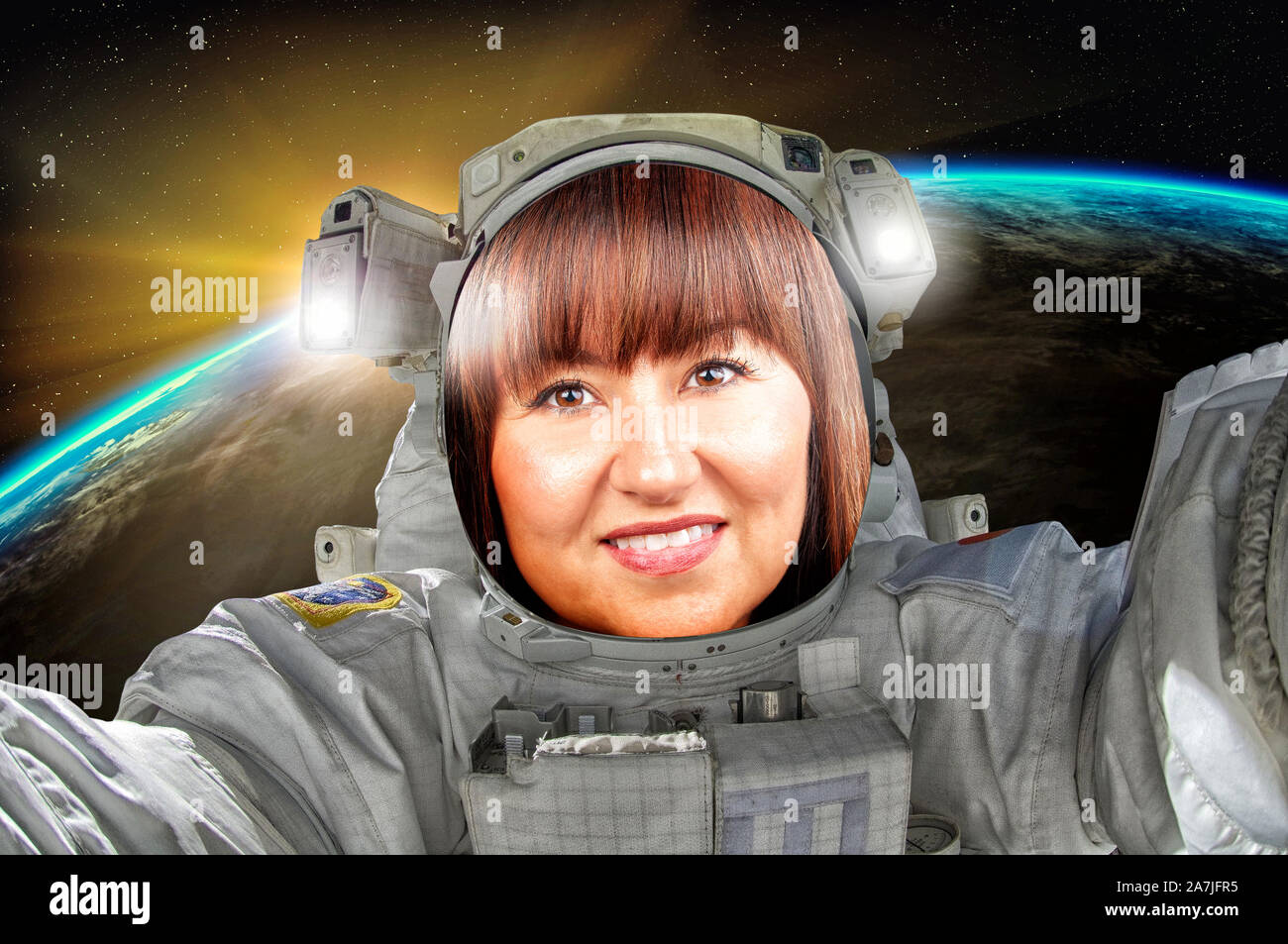 Beautiful brunette portrait woman astronaut or cosmonaut exploring the universe Stock Photo