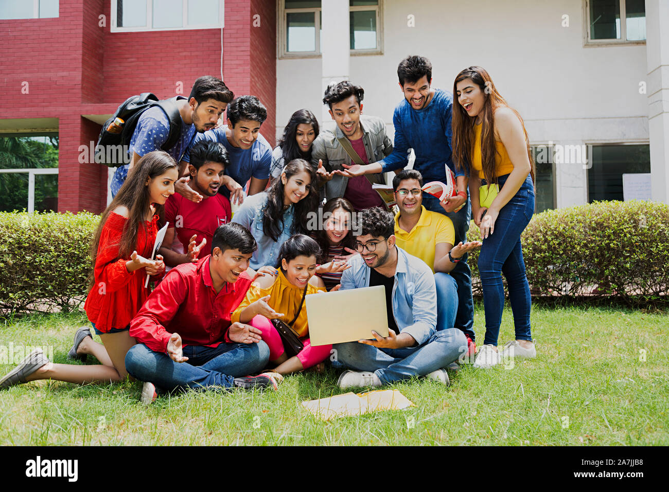 Group Of Indian College Students Friends Studying laptop E-Learning Education In-Outside Campus Building Stock Photo