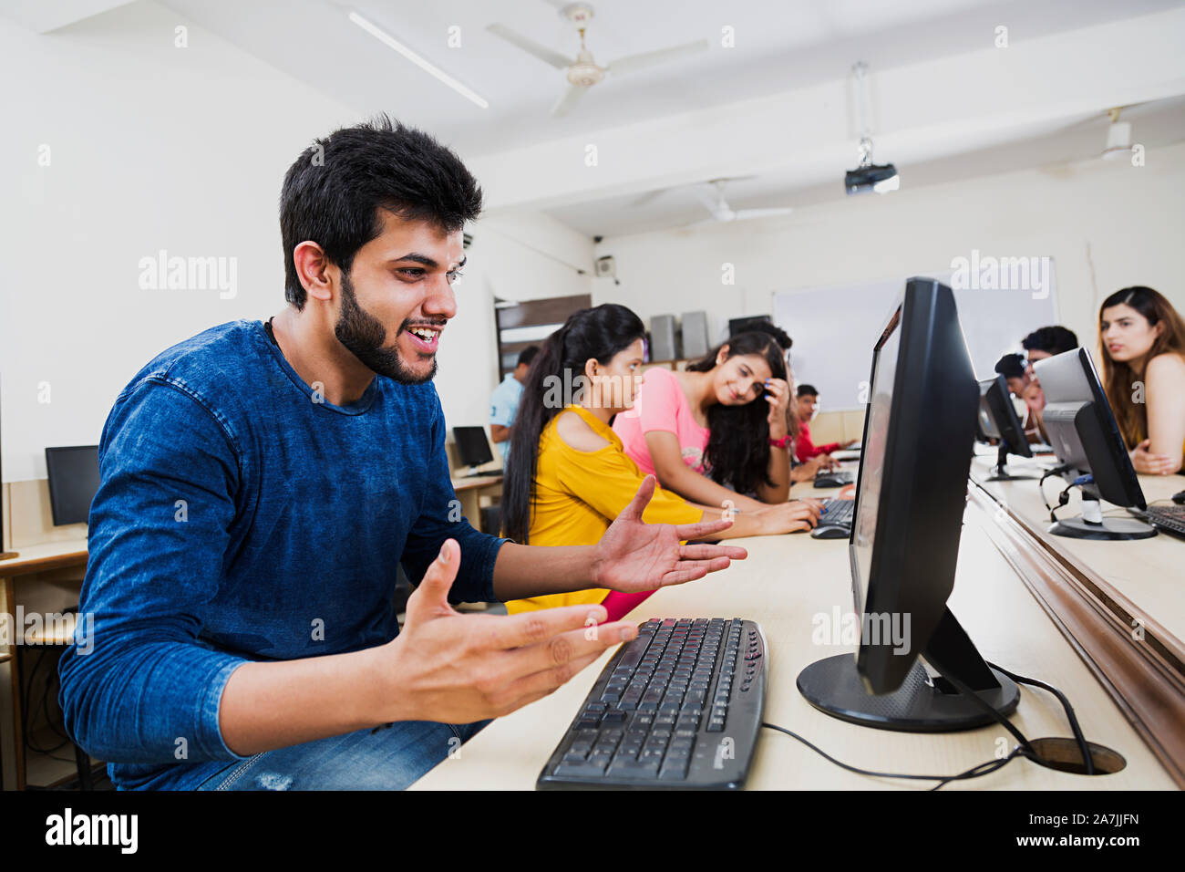 Surprised Young Male College Student Studying Looking-At Computer ...