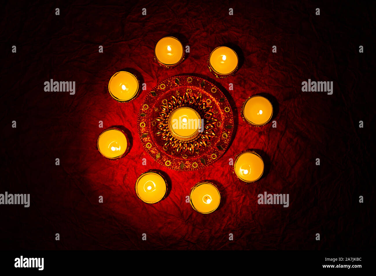 Close-up indian Festival Diwal Burning candles Lamps lighting on Diwali Festival Celebration Stock Photo