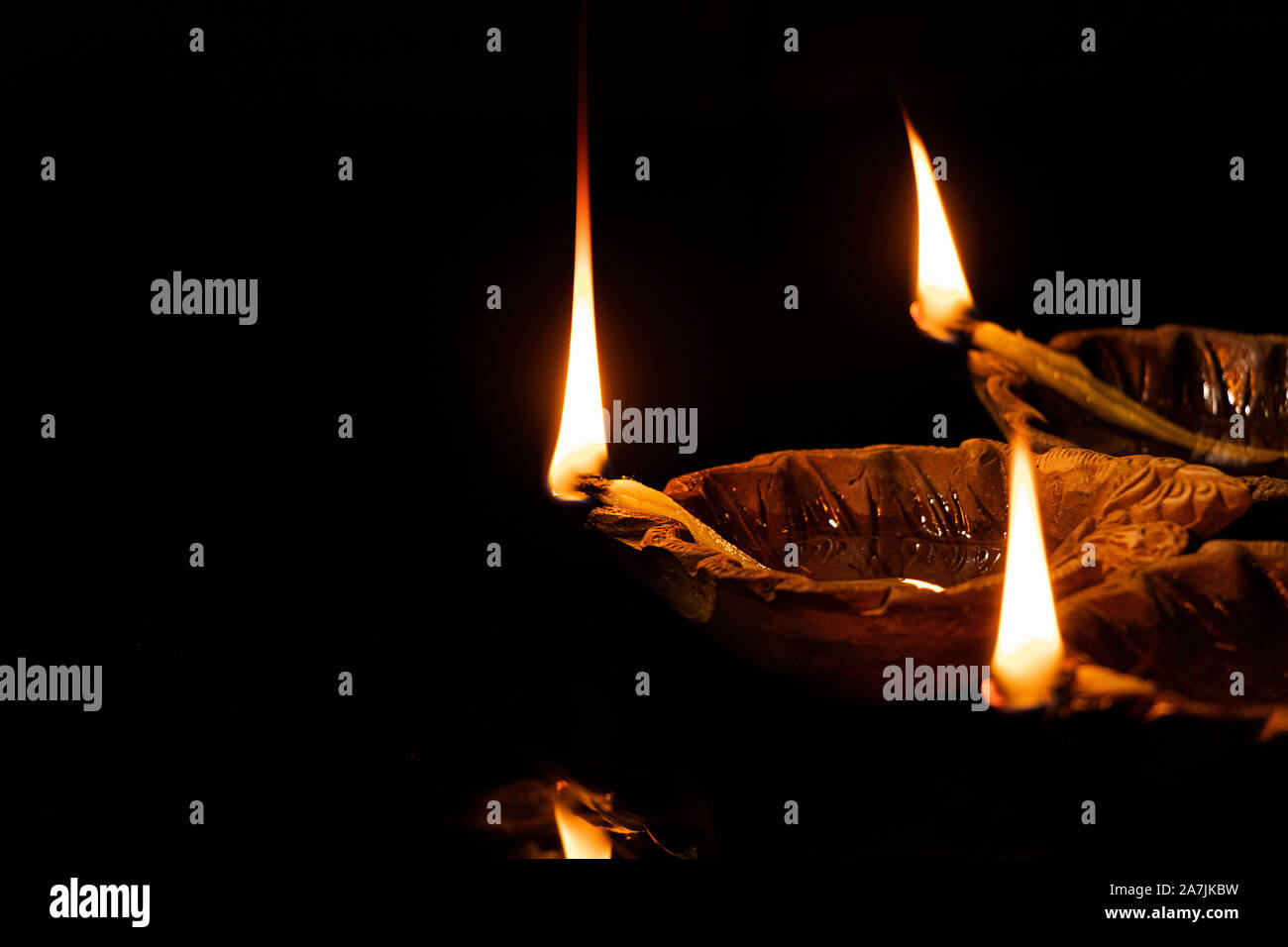 nobody Shot Traditional Diwali Diya Oil-lamps lit on-the occasion of Diwali festival Stock Photo