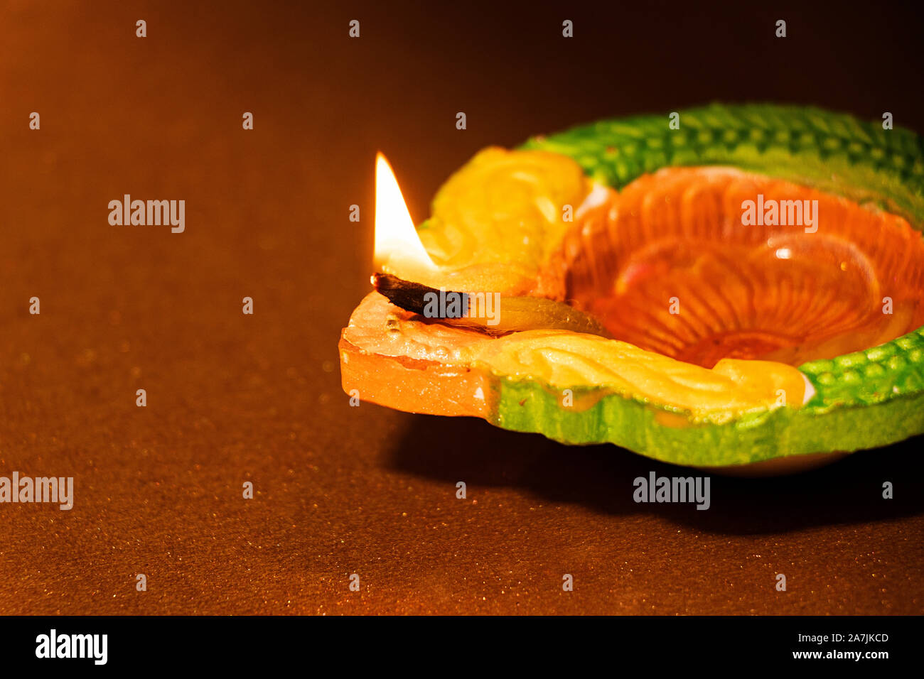 Close-up Burning Clay Diya oil-lamp Lighting During Diwali Festival Celebration In-India Stock Photo