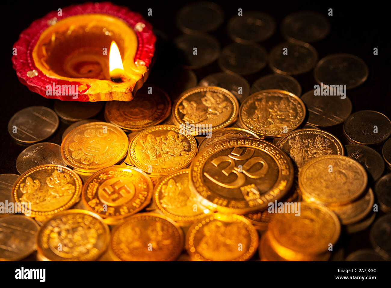 Diwali Diya Oil-lamp With Gold Coins During Diwali festival Celebration Stock Photo