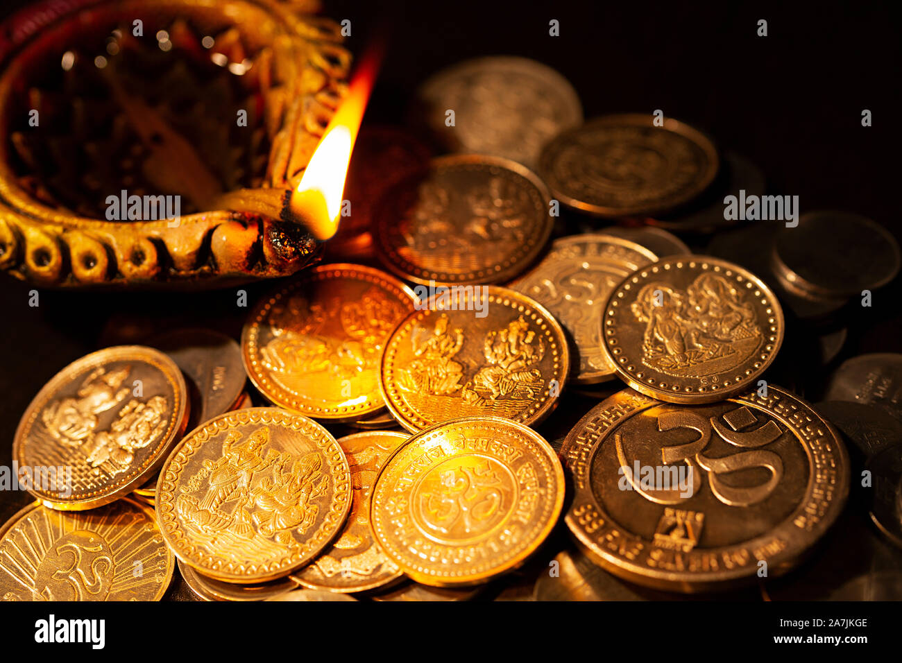 Diwali oil lamps with gold coins during Diwali festival Celebration Stock Photo