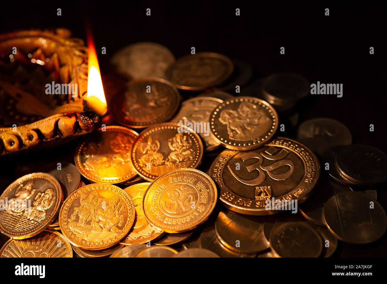 Nobody Shot Diwali oil lamps with gold coins during Diwali festival Celebration Stock Photo