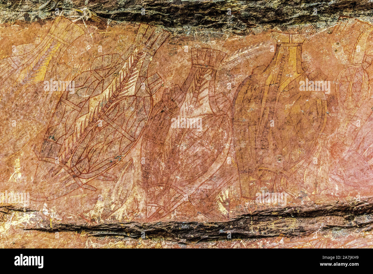 Ancient Aboriginal Art: hand prints, animal herds, spiral, Kakadu National Park, Australia Stock Photo