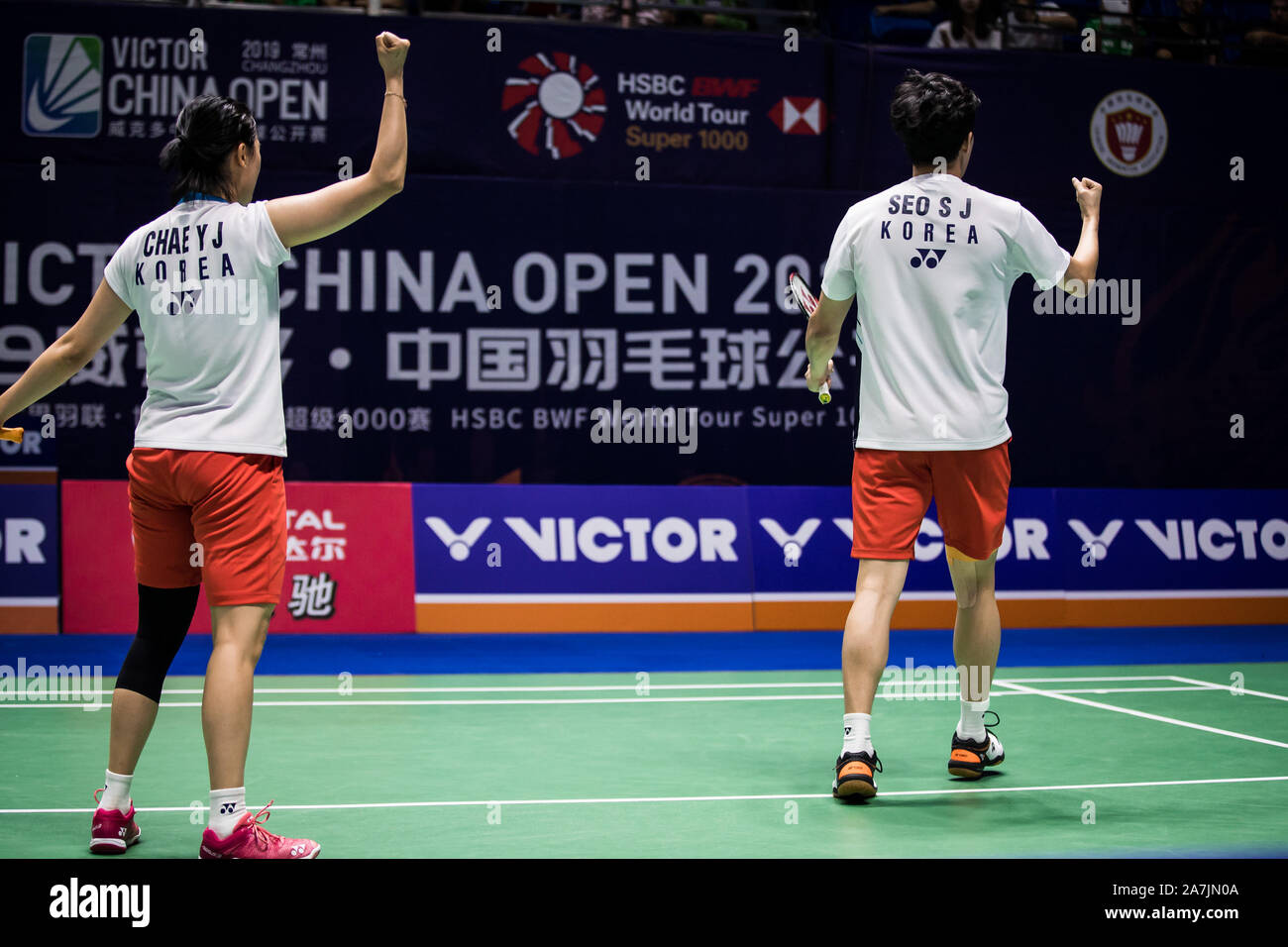 South Korean professional badminton players Seo Seung-jae and Chae Yoo-jung compete against Japanese professional badminton players Yuta Watanabe and Stock Photo