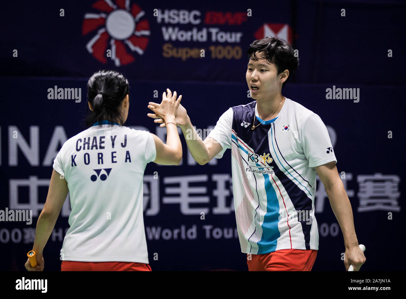 South Korean professional badminton players Seo Seung-jae and Chae Yoo-jung  compete against Japanese professional badminton players Yuta Watanabe and  Stock Photo - Alamy
