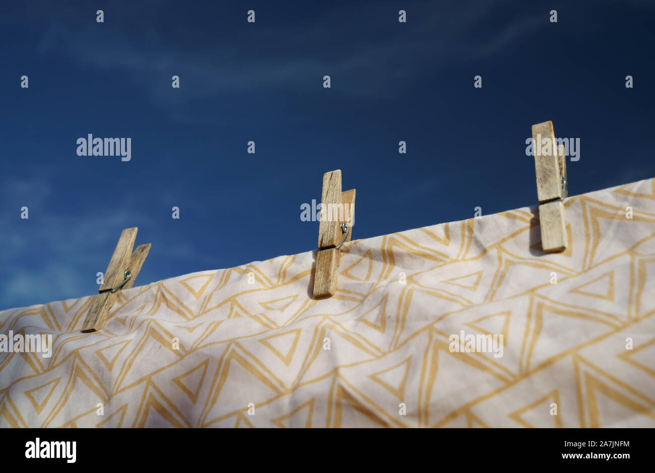 Wooden clothes pegs a plastic free solution. Stock Photo