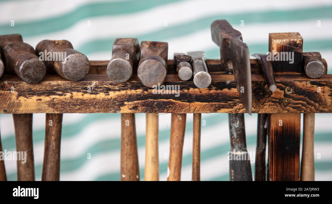 Old Hammers in a Rack For Sale at a Market Stock Photo Alamy