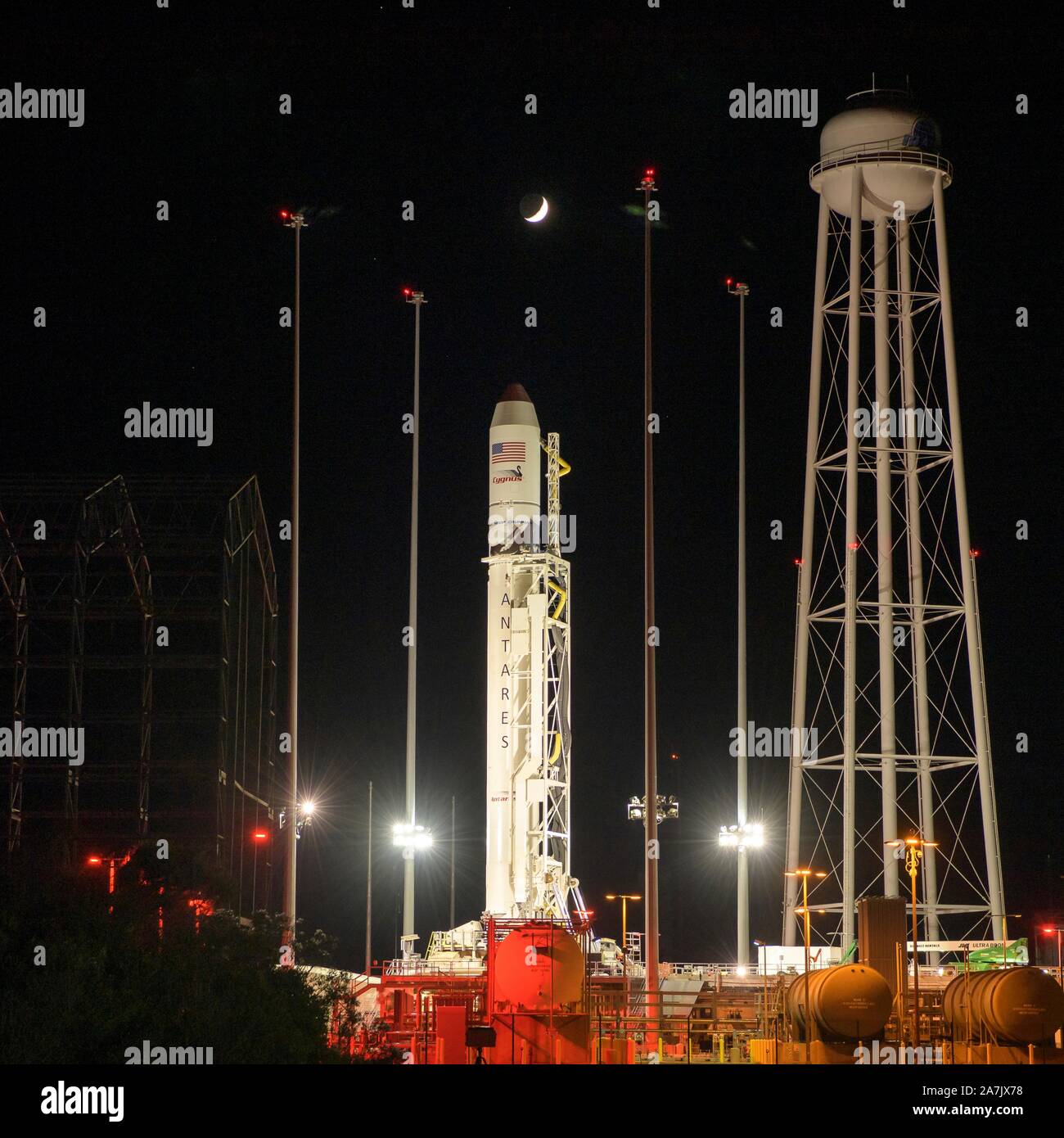 The Northrop Grumman Antares rocket, with Cygnus resupply spacecraft onboard, is raised into vertical position in preparation for liftoff on launch Pad-0A at the NASA Wallops Flight Facility November 1, 2019 in Wallops, Virginia. The commercial cargo resupply mission will deliver 8,200 pounds of research, crew supplies and vehicle hardware to the the International Space Station. Stock Photo