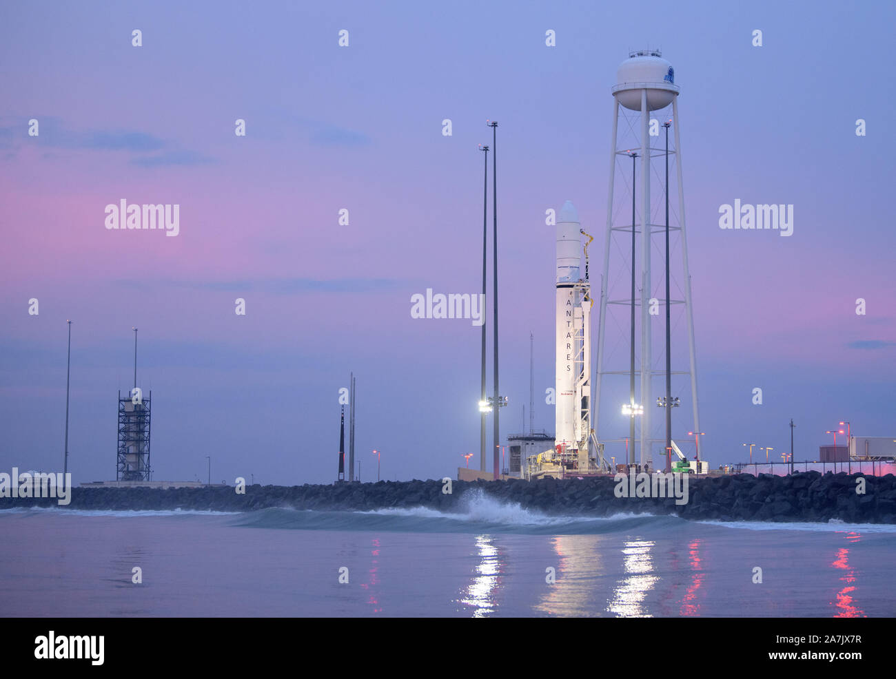 The Northrop Grumman Antares rocket, with Cygnus resupply spacecraft onboard, on launch Pad-0A at the NASA Wallops Flight Facility October 30, 2019 in Wallops, Virginia. The commercial cargo resupply mission will deliver 8,200 pounds of research, crew supplies and vehicle hardware to the the International Space Station on November 2nd. Stock Photo