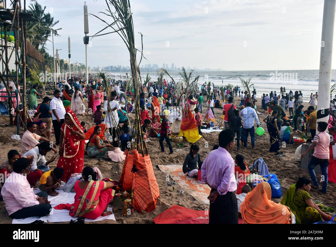Mumbai, India. 02, Nov 2019. Indian Hindu devotees take part in the rituals of Chhath Puja festival at Juhu Beach on November 02, 2019, in Mumbai. Stock Photo