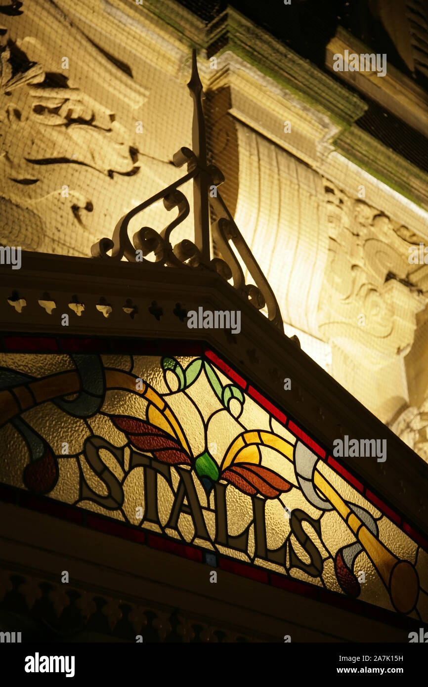 Stained glass "Stalls" sign on the Grand Theatre, Blackpool, UK Stock