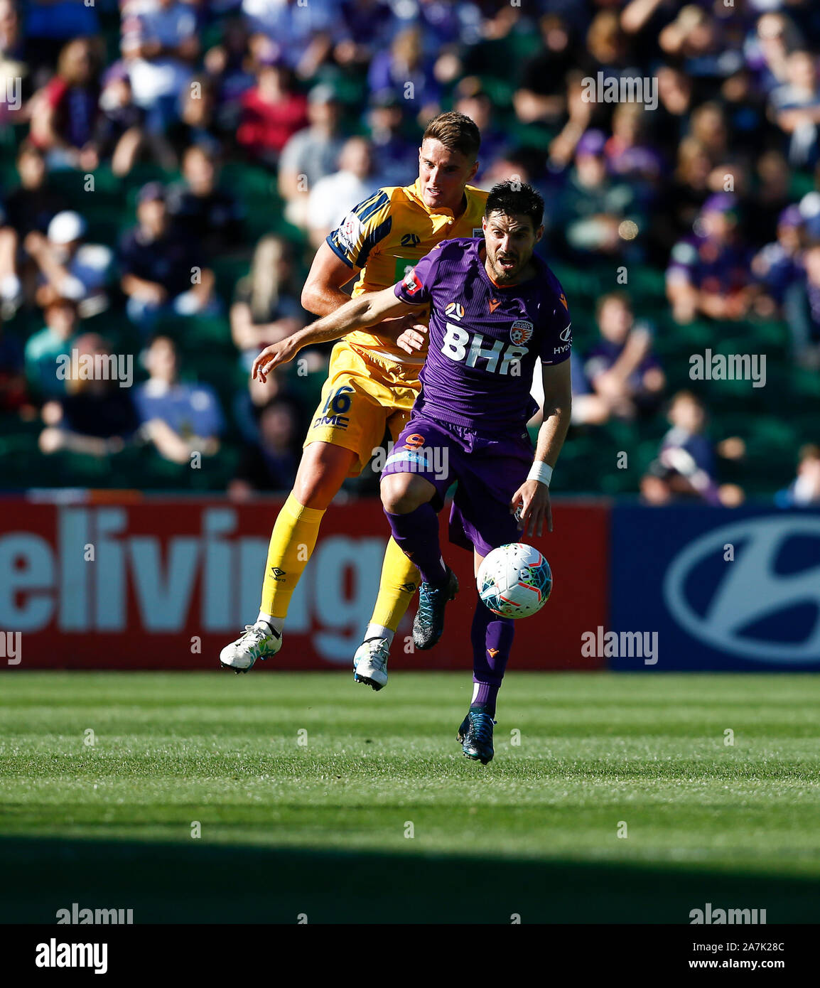 Perth, Australia. 3rd November 2019; HBF Park, Perth, Western Australia, Australia; A League Football, Perth Glory versus Central Coast Mariners; Bruno Fornaroli of the Perth Glory shields the loose ball against Dylan Fox of the Central Coast Mariners - Editorial Use Credit: Action Plus Sports Images/Alamy Live News Stock Photo