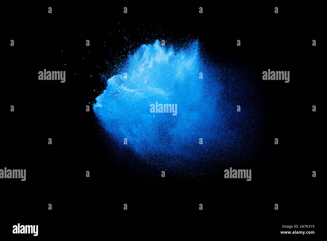 Blue color powder explosion cloud on black background.Closeup of Blue ...