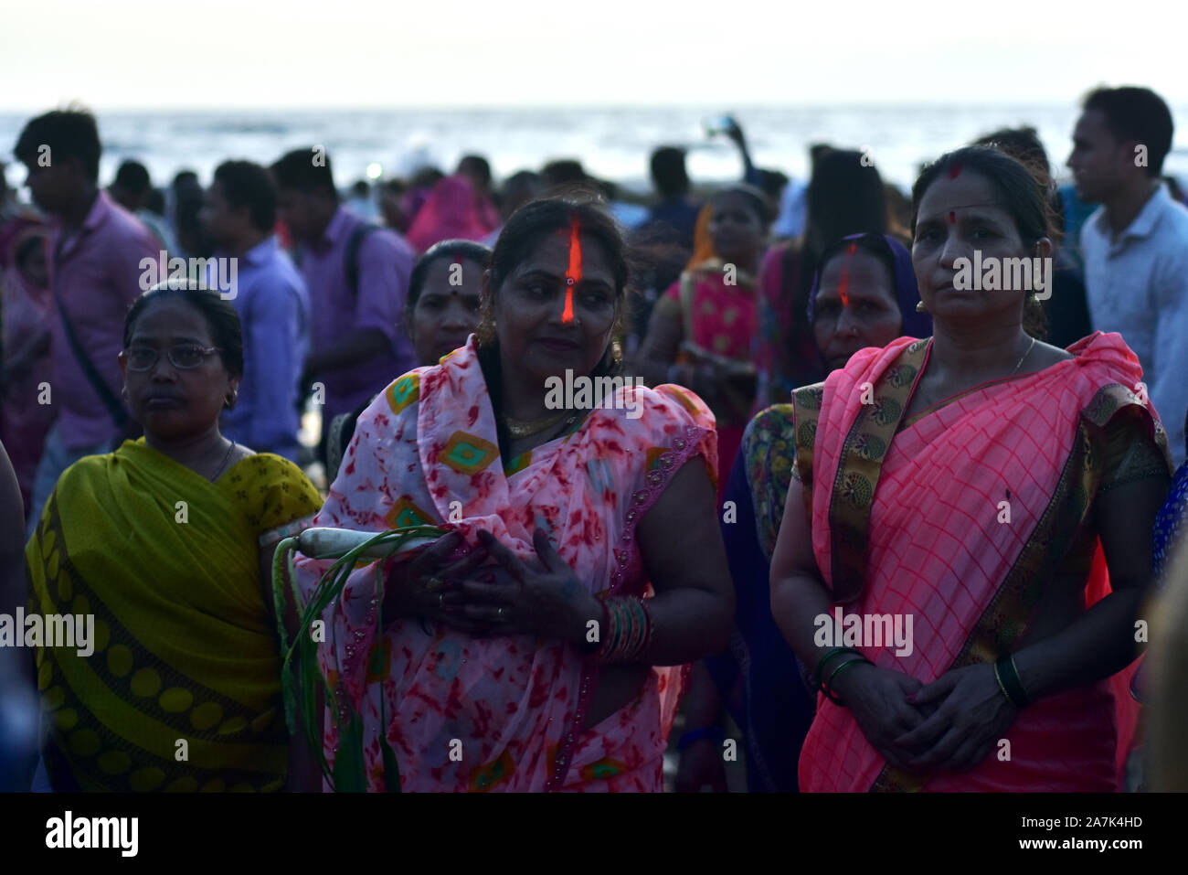 Mumbai, India. 02, Nov 2019. Indian Hindu devotees take part in the rituals of Chhath Puja festival at Juhu Beach on November 02, 2019, in Mumbai. Stock Photo