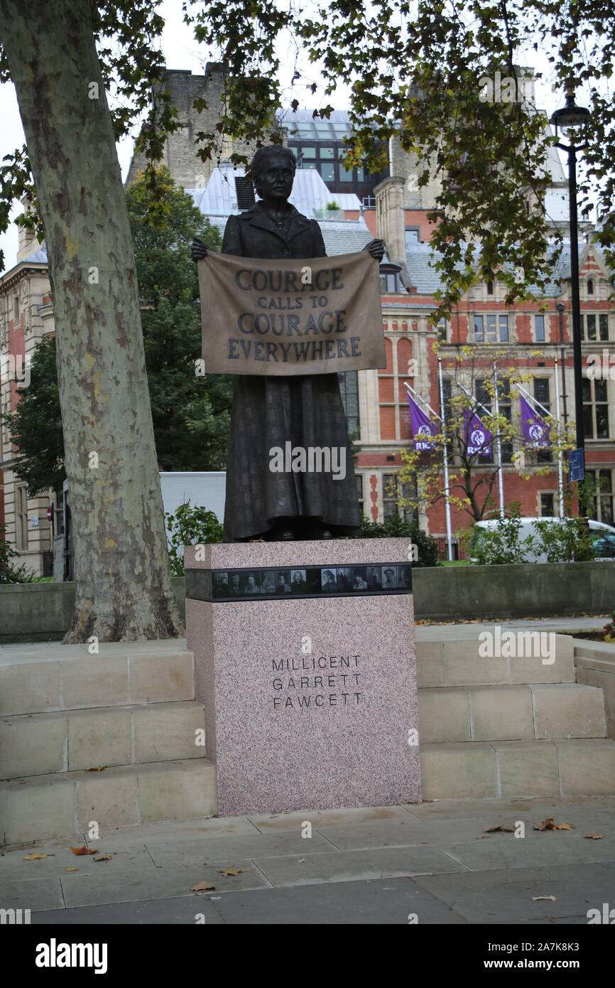 29 October 2019 London, Parliament Square, Statue of Votes for Women suffragette Millicent Fawcett. banner: Courage calls to Courage Everywhere'. Stock Photo